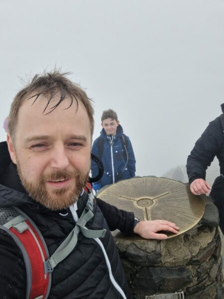 Our team completing a mountain range walk to raise money for charity